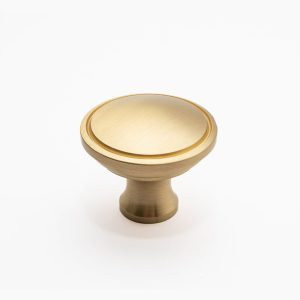 Pomo o botón circular de mueble en bronce satinado con relieve perimetral modelo Itacare.