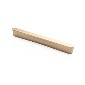 Tirador de mueble lineal prismático en acabado bronce satinado modelo Puno, diseño de perfil bajo.