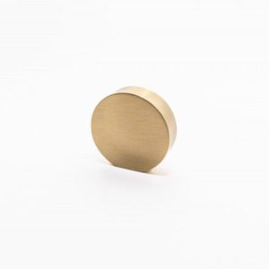 Tirador de mueble circular plano en acabado bronce satinado modelo Río de Janeiro, diseño minimalista.
