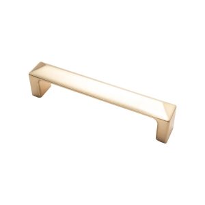 Tirador de mueble lineal con extremos biselados en acabado bronce satinado modelo Tecna.